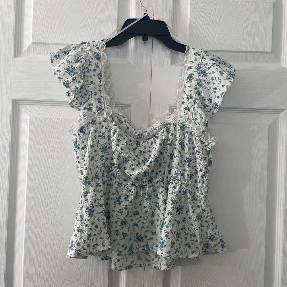 E&M blue floral women’s top